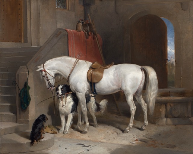 Horses and dogs in the gateway of Naworth Castle