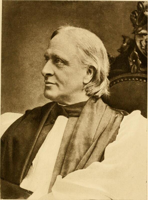 Sepia-toned portrait of an older man with long hair, dressed in clerical robes, seated in a carved wooden chair, looking slightly to the side.
